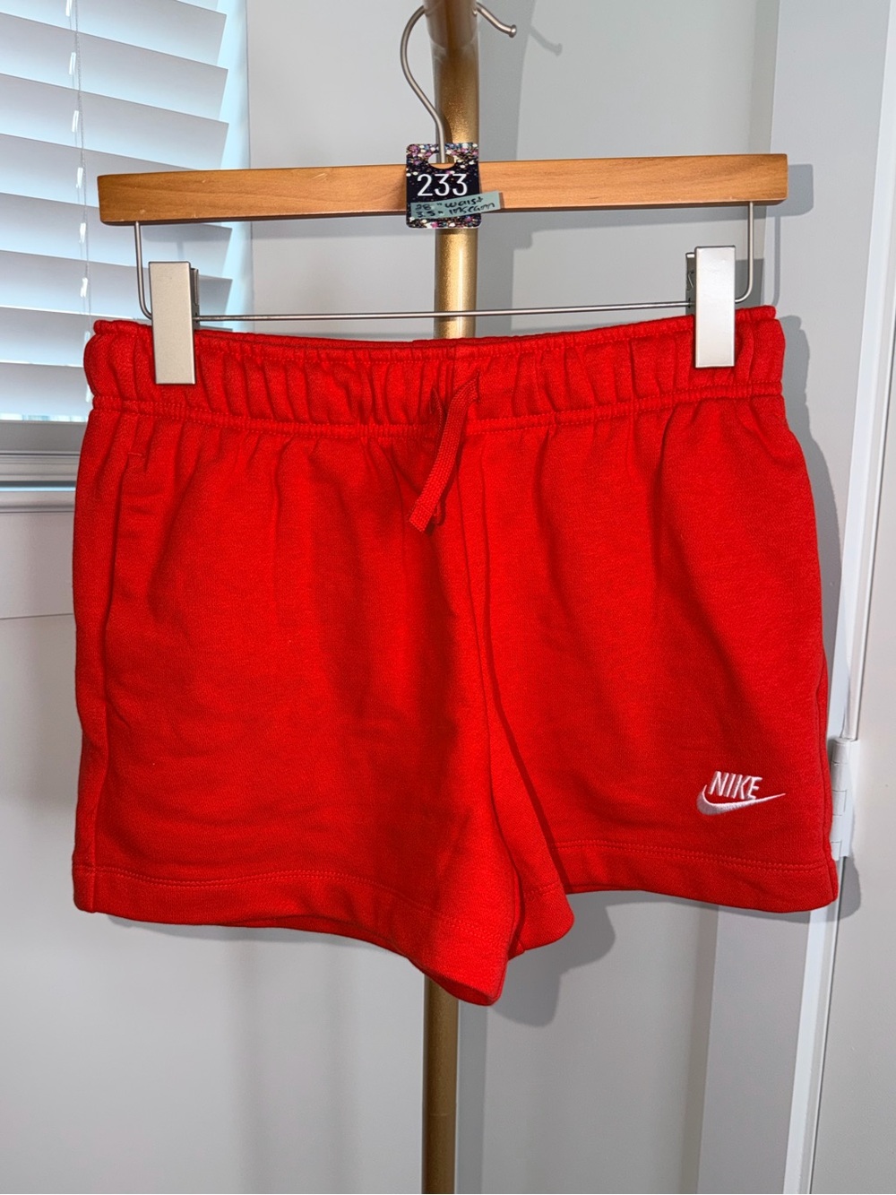 233. Nike Women's Sportswear Club Fleece Mid-Rise Shorts in University Red